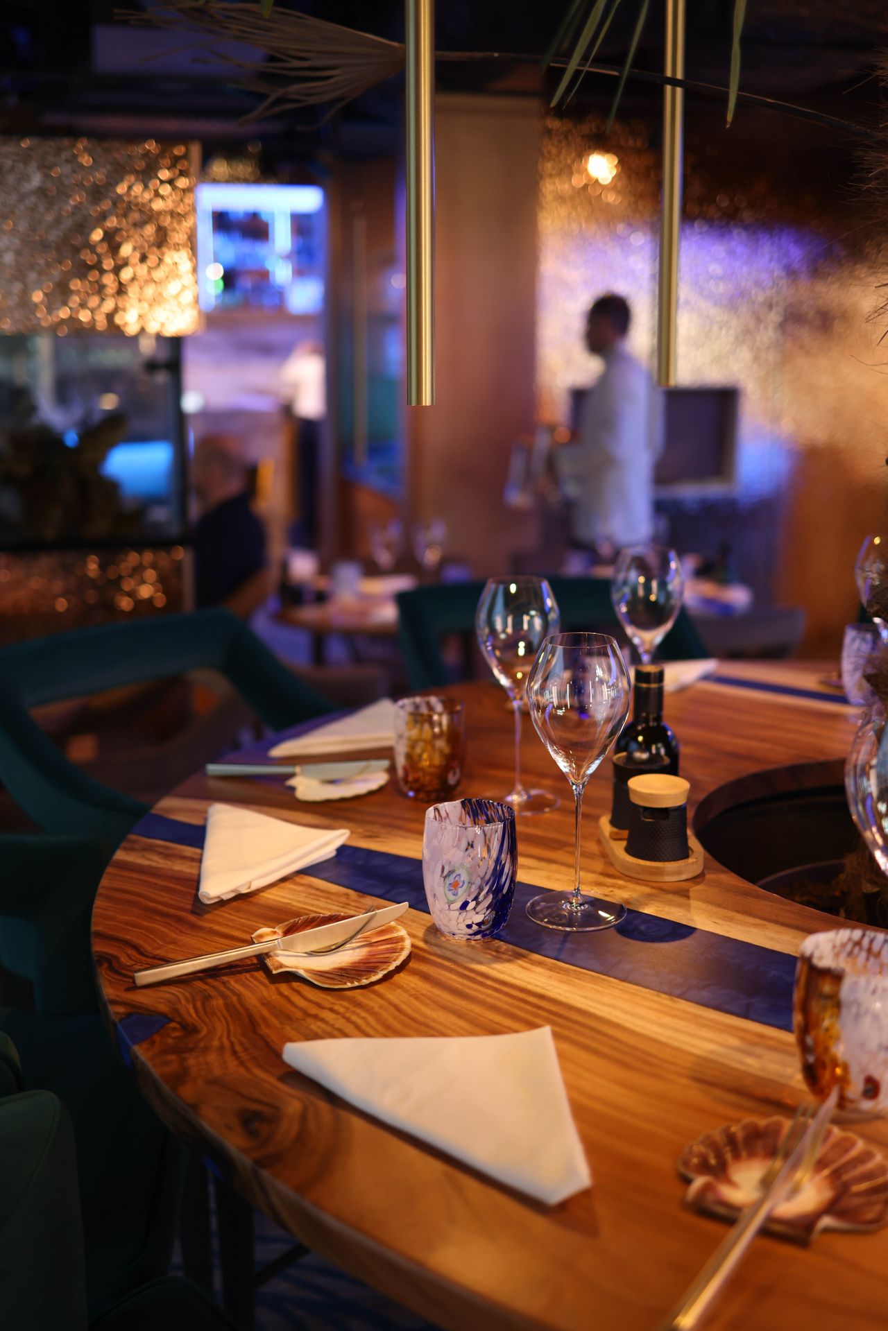 Set table in an upscale restaurant with warm lighting